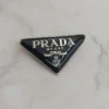 IMG_20240102_003859_577 PRADA三角盾胸針 可別在領帶