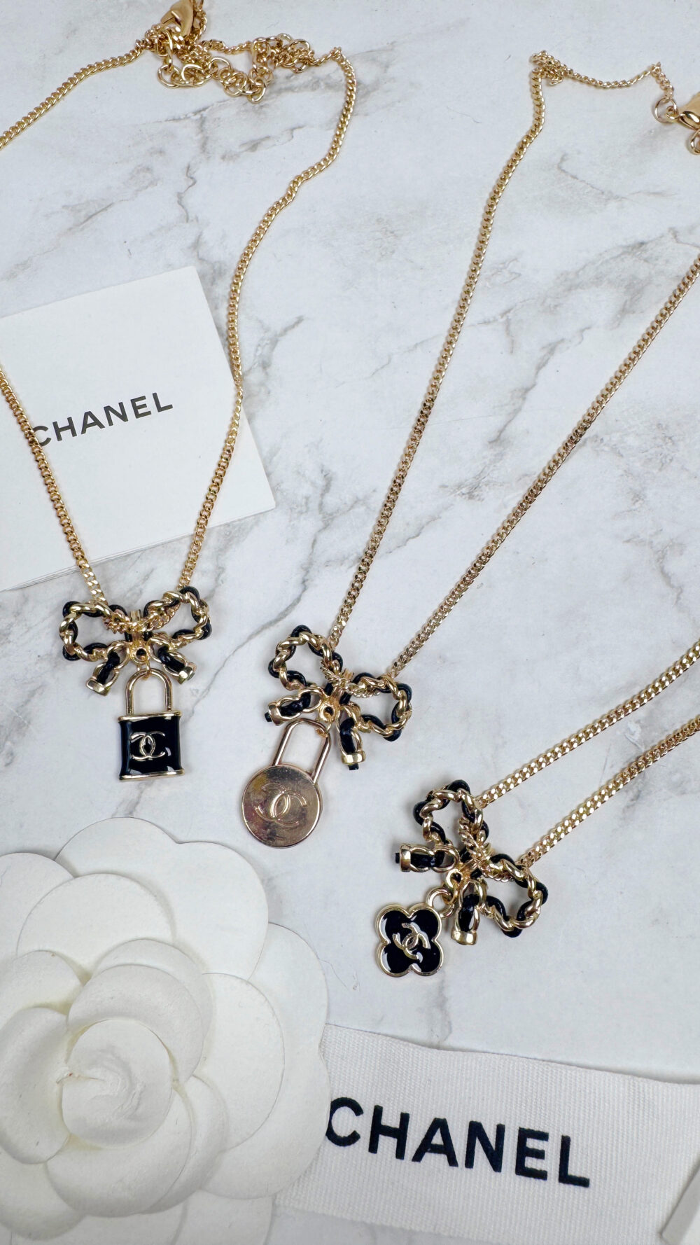 20251106_173438520_iOS 全館特價!!皮穿鍊蝴蝶結項鍊&黑色幸運草