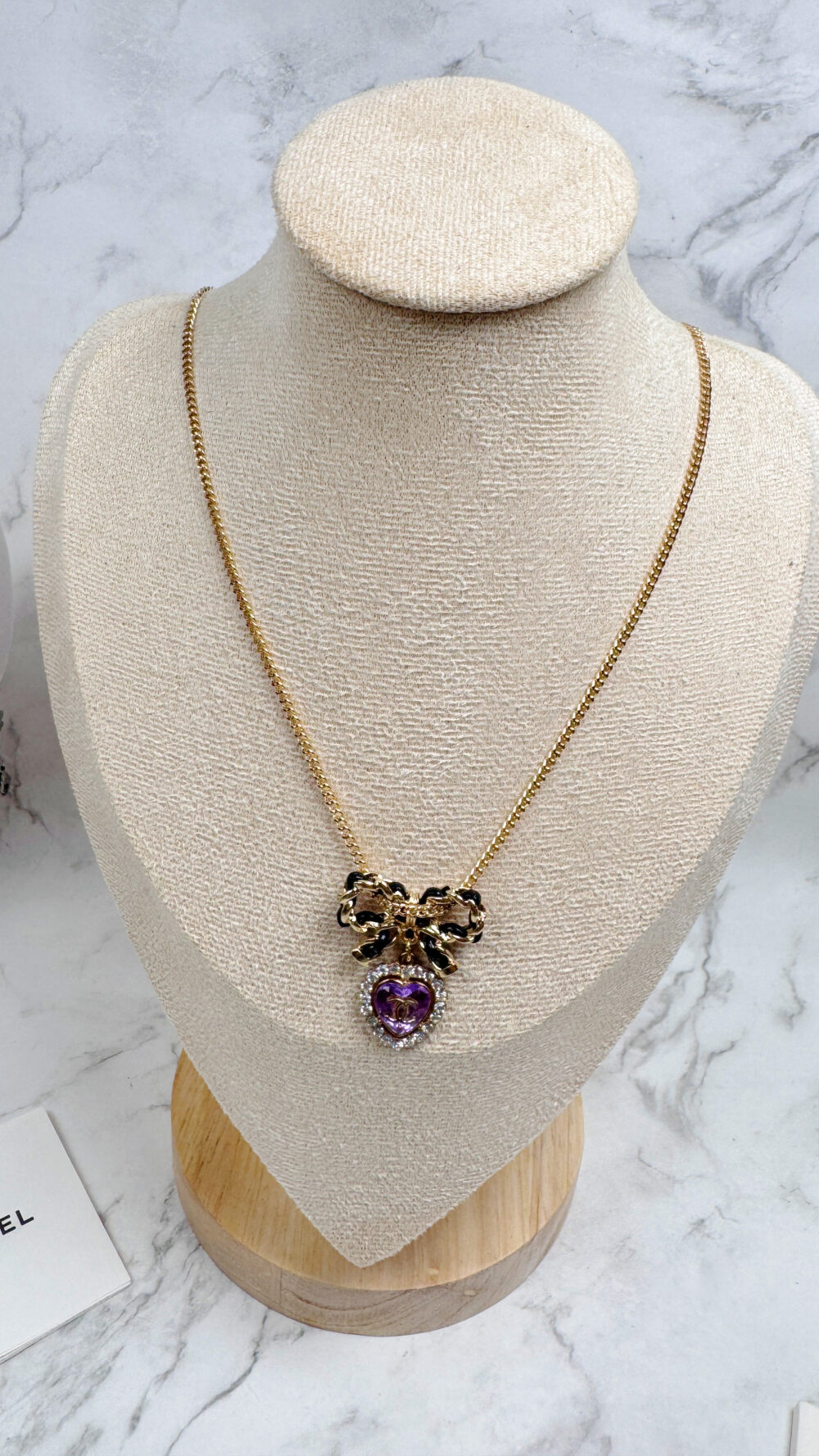 20251106_190317079_iOS 全館特價!!皮穿鍊蝴蝶結項鍊&紫色愛心