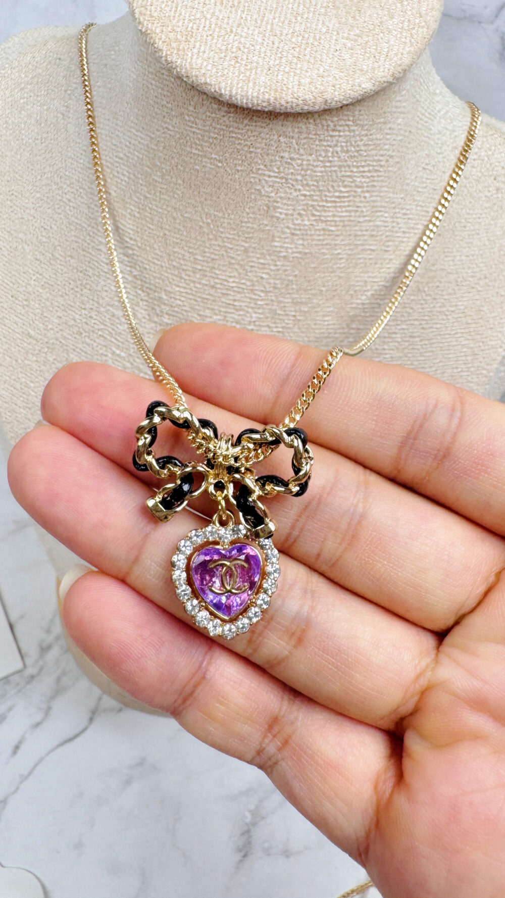 20251106_190317706_iOS 全館特價!!皮穿鍊蝴蝶結項鍊&紫色愛心