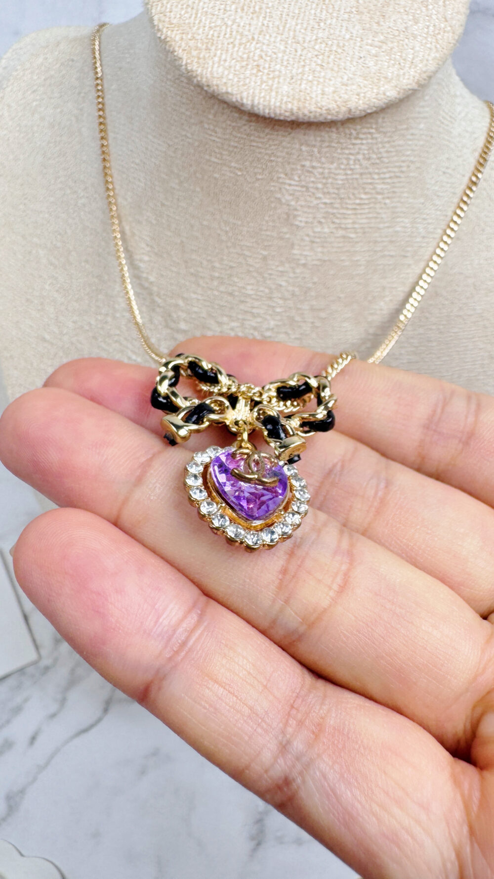 20251106_190318307_iOS 全館特價!!皮穿鍊蝴蝶結項鍊&紫色愛心