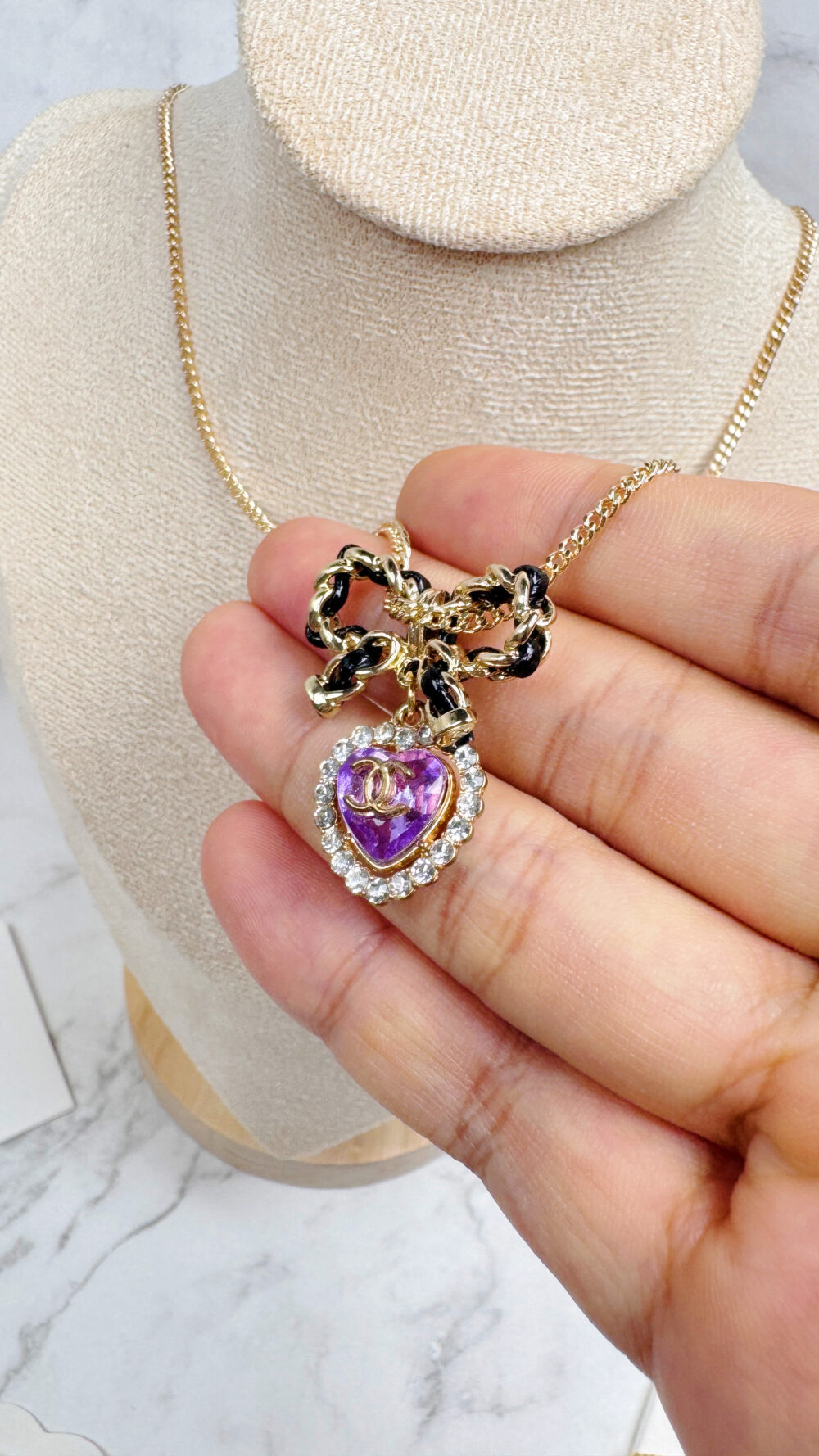 20251106_190318889_iOS 全館特價!!皮穿鍊蝴蝶結項鍊&紫色愛心