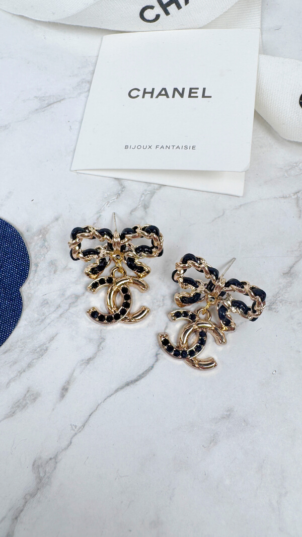 全館特價!!皮穿鍊蝴蝶結 菱格紋+黑鑽