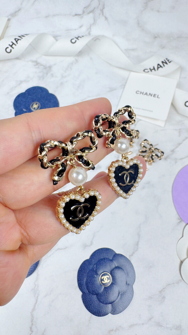 全館特價!!皮穿鍊蝴蝶結 黑色珍珠愛心