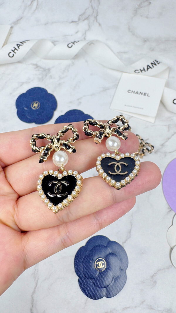 全館特價!!皮穿鍊蝴蝶結 黑色珍珠愛心