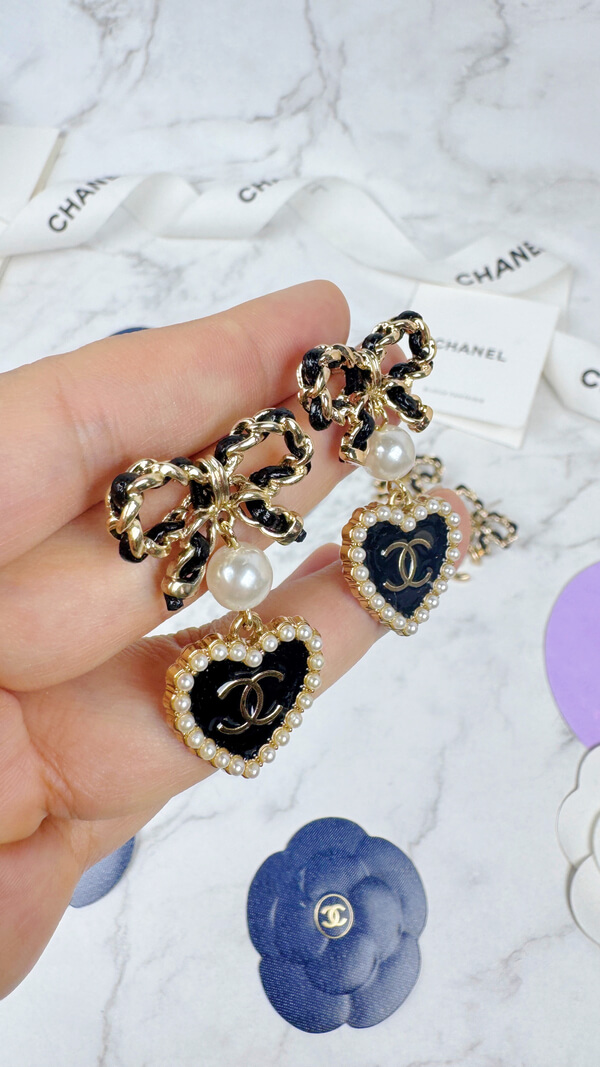 全館特價!!皮穿鍊蝴蝶結 黑色珍珠愛心