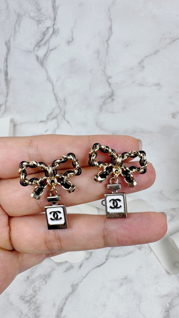 全館特價!!皮穿鍊蝴蝶結 金/銀香水罐