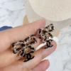 全館特價!!皮穿鍊蝴蝶結 黑金小雙C