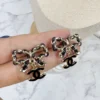 全館特價!!皮穿鍊蝴蝶結 黑金小雙C